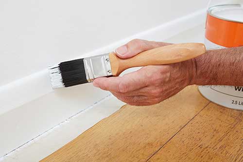 How to Keep Paint off a Carpet When Painting Baseboard - Fine